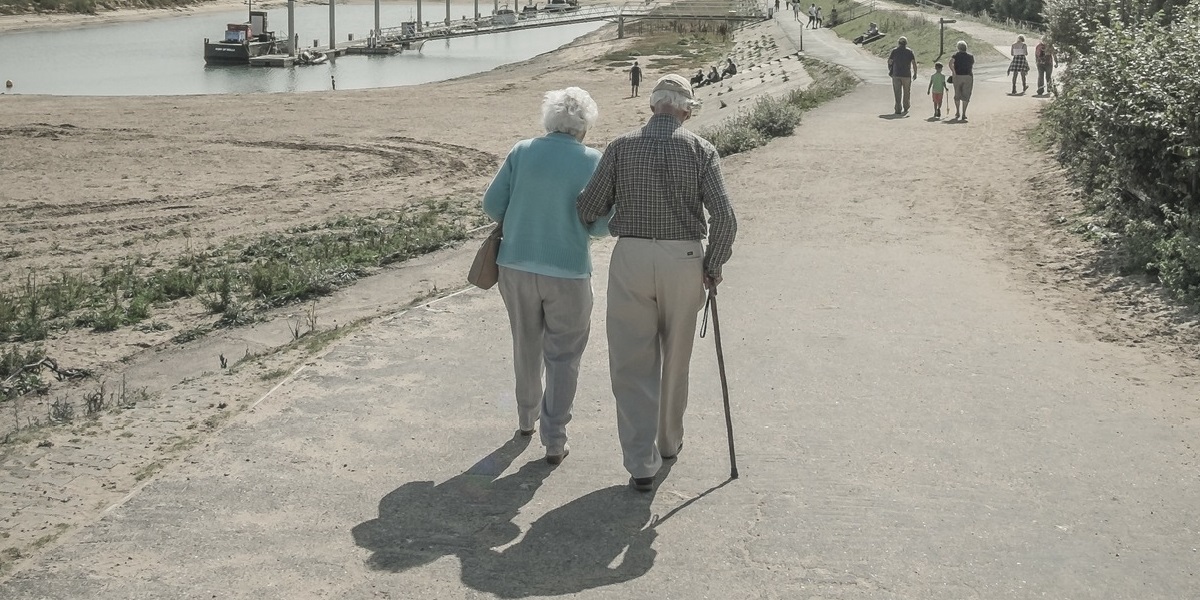 Elderly couple walking