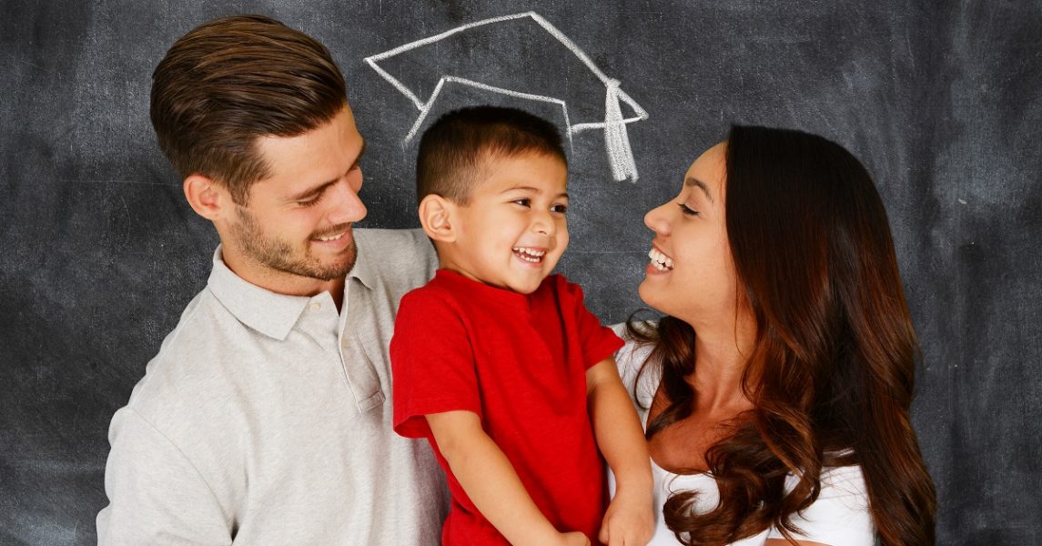 young parents with kid graduate